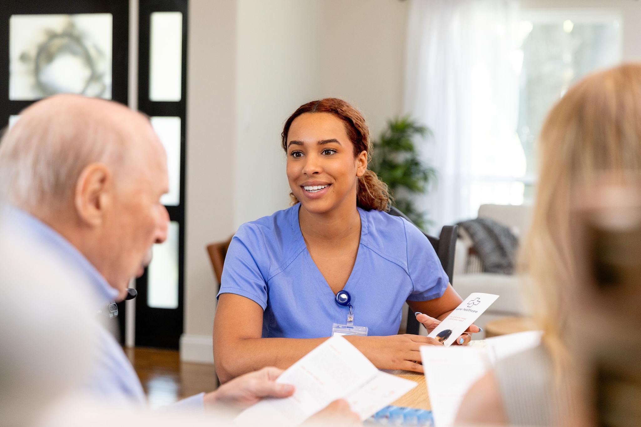 Nurse interacting with residents
